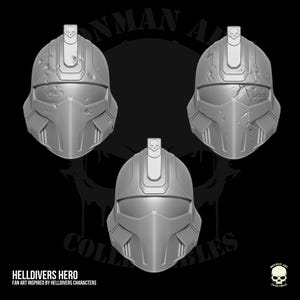 Op de afbeelding: Drie grijze helmen met een centrale richel en een klein schedel-embleem aan de bovenkant. Twee helmen hebben gevechtssporen met krassen en deuken, terwijl er één glad is. De tekst HELLDIVERS HERO en FAN ART INSPIRED BY HELLDIVERS CHARACTERS is zichtbaar.