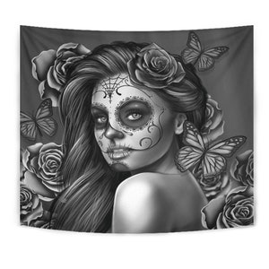 May include: Black and white illustration of a woman with a sugar skull makeup design. She is surrounded by roses and butterflies.