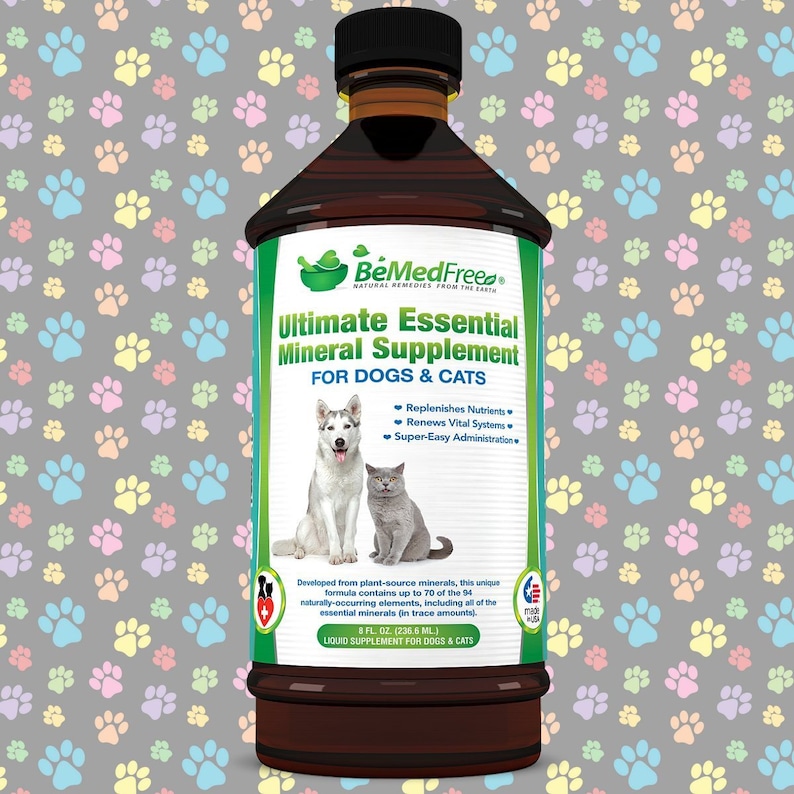May include: A brown glass bottle with a green label that reads "BeMedFreed" and "Ultimate Essential Mineral Supplement for Dogs & Cats". The label also features a dog and cat, and lists the product's benefits: Replenishes Nutrients, Renews Vital Systems, and Super-Easy Administration. The bottle is 8 fl oz (236.6 ml) and is made in the USA.