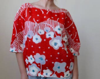 Oversized red top with all over floral print- lightly sheer, S/M