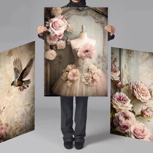 May include: A set of three vintage-inspired art prints featuring a delicate white dress with pink roses, a bird in flight, and a bouquet of pink roses against a distressed background.