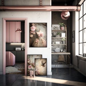 May include: Three framed prints with floral and bird designs hang on a white wall in a modern loft space. The prints are in black frames and feature a vintage aesthetic.