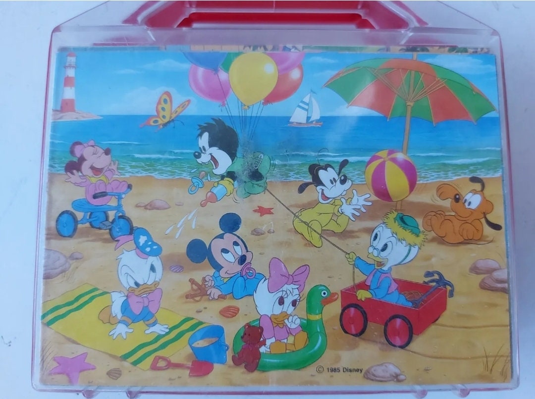 Set di puzzle vintage con cubi di immagini Disney Topolino in una