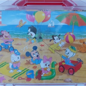 Set di puzzle vintage con cubi di immagini Disney Topolino in una custodia