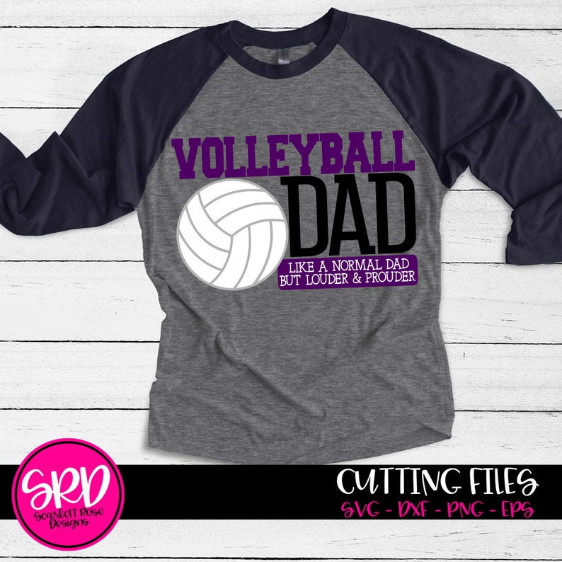 May include: A gray and navy blue baseball t-shirt with the text "Volleyball Dad" in purple and black. The text "Like a normal dad but louder & prouder" is also included in black. A white volleyball graphic is featured on the shirt.