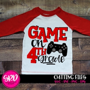 May include: Red and black graphic design for a t-shirt that says "Game on 4th grade" with a video game controller graphic.