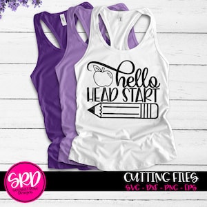 May include: A white tank top with a black graphic design that says "hello head start" with a red apple and a pencil. The tank top is layered on top of a purple tank top.
