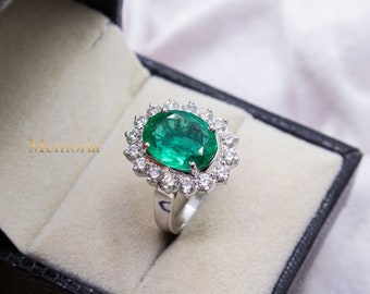 Smaragd Diamant Halo Ring: 750er Weißgold