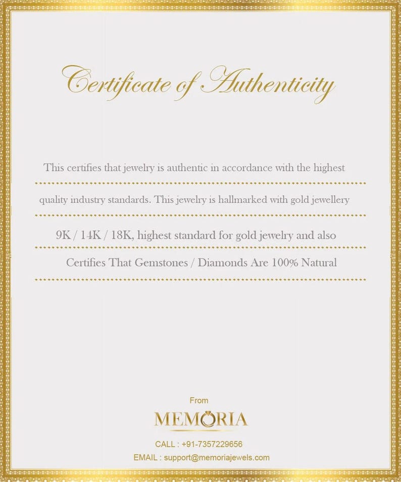 May include: Certificate of Authenticity for jewellery, stating that it is made with 9K, 14K, or 18K gold and that gemstones and diamonds are 100% natural. The certificate is from Memoria, with a phone number and email address.