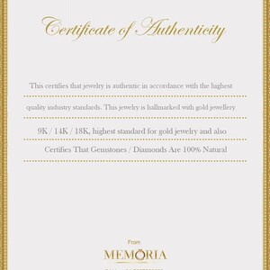 Certificate of authenticity document with a decorative gold border and text detailing jewelry standards.
