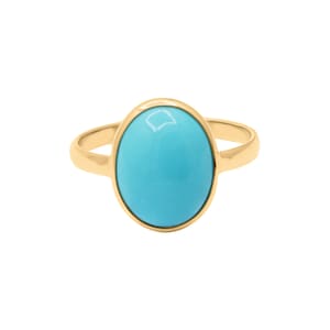 May include: A gold ring with a turquoise oval gemstone.