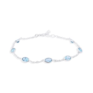 Blue Topaz Bracelet: Oval Faceted Gemstone, 925 Sterling Silver, 8 Inch