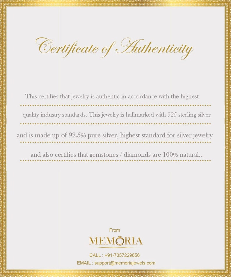 May include: Certificate of Authenticity for jewelry, stating it is made with 92.5% pure silver and 100% natural gemstones or diamonds. The certificate is from MEMORIA, with contact information for phone and email.