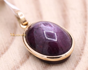 Natural Star Ruby Pendant: 14k Yellow Gold