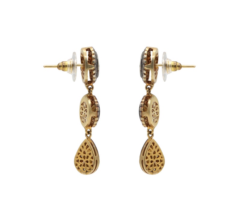 Close-up of individual Polki diamonds, showcasing natural sparkle and handcrafted setting