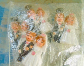 package of 1970's NOS wedding cake topper picks