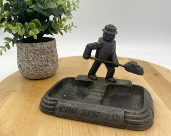 1920's Iron Fireman Ashtray (2) - Etsy