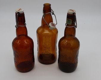 ヴィンテージ グロルシュ ビール瓶 - ダークアンバーエンボス加工