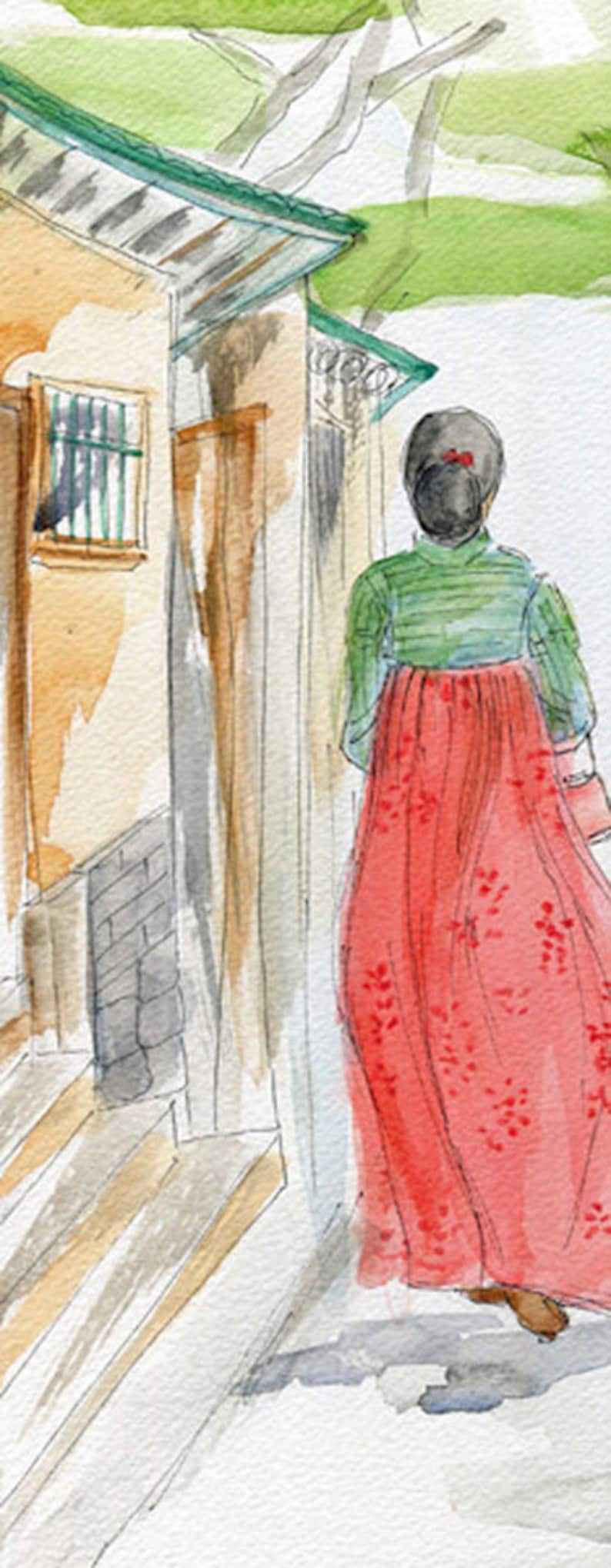 May include: A watercolor painting of a woman wearing a traditional Korean hanbok dress. She is walking down a narrow street with a building on the left side of the image.