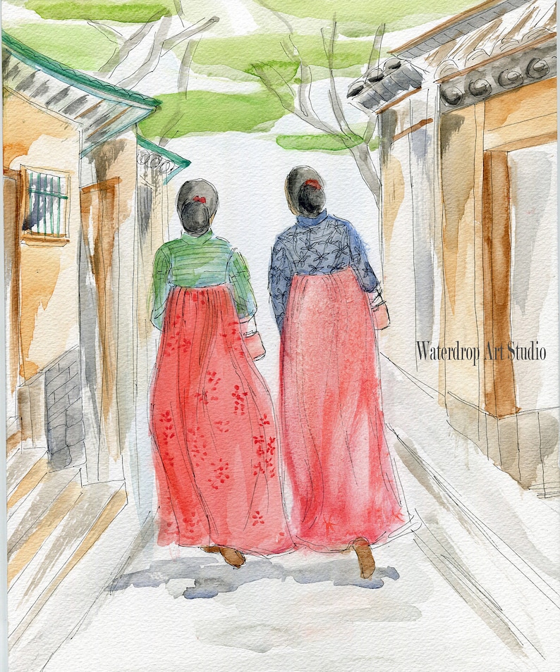 May include: Two women wearing traditional Korean hanbok dresses walk down a narrow street lined with buildings. The women's dresses are red and pink with floral patterns. The street is paved with gray stones and the buildings are painted in shades of beige and brown.