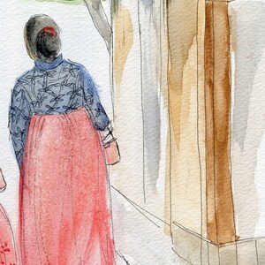 May include: Two people wearing traditional Korean hanbok dresses walk down a street with a building in the background. The hanbok dresses are a light blue and a pink color. The building is painted in shades of brown and white.