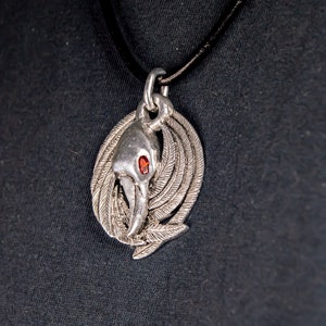 Magic fiery eyed witches raven necklace , crow totem pendant on leather string , red garnet stone bird medallion , flying bird wiccan symbol