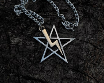 May include: A silver chain necklace with a silver five-pointed star pendant featuring a lightning bolt design.