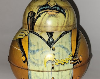 Lata de tabaco Bristol Ware Roly Poly Businessman de 1979 con papel - Chein Ind.