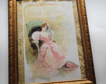 1897 Atlantic & Pacific Tea Company A and P Calendar Page- Jan-Feb - Lovely Young Woman in Elegant Pink Gown Reclining