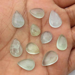 Pedra preciosa azul-celeste água-marinha. Única! Água-marinha natural. Lote de atacado em formato de pêra com 10 peças de cabochão de água-marinha para joias. 39 Cts KB-3598