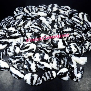 Buffalo Türkis Cabochon. AAA + Natürlicher Schwarz Weißer Türkis. Buffalo-Türkis-Edelstein-Großhandelsposten für Schmuck 1 bis 108 Stück.