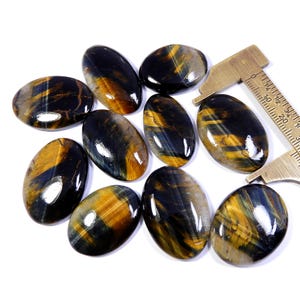 Blauwe tijgeroog cabochon. Nice~ natuurlijke geelblauwe tijgeroog edelsteen. Ovaal blauw tijgeroog voor sieraden. Groothandelkavel van 10 stuks 319 kt KB-10740