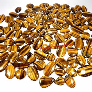 Tijgeroog cabochon. Tijgeroog edelsteen groothandel. Natuurlijk geel flitsend tijgeroog. Tijgerooggenezing met gemengde vorm voor sieraden. 1 tot 105 stuks