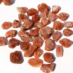 Piedra solar en bruto con entramado arcoíris. ¡Excelente calidad! Piedra solar brillante en bruto. Lote al por mayor de piedra solar naranja y roja natural. 100 cts a 1 kg.