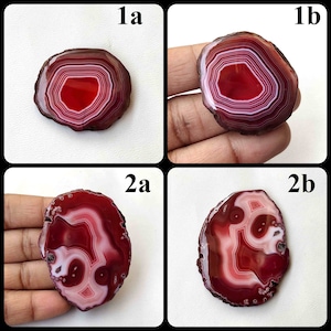 Puede incluir: Cuatro rebanadas de ágata con bandas rojas y blancas. Las rebanadas están dispuestas en una cuadrícula con las etiquetas 1a, 1b, 2a y 2b.