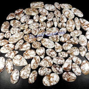 Natuurlijke wilde paard jaspis cabochon. Witbruine wilde paard jaspis edelsteen. Groothandel: 27 stuks losse magnesietcabochon van 1000 kt.