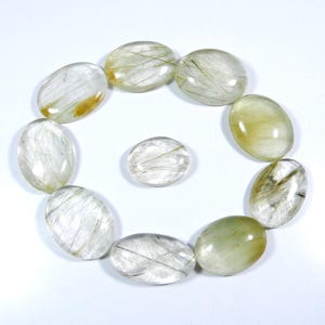 Multi gouden rutiel cabochon. Natuurlijke koperen rutielkwarts edelsteen. Ovale vorm groothandel partij 10-delig kristalrutiel voor sieraden 334 kt KB-11178