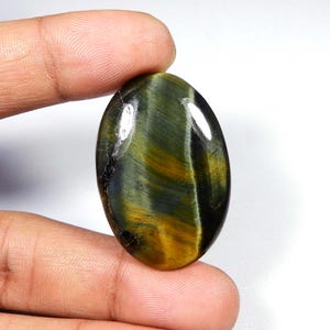 Cabochon bleu oeil de tigre. Oeil de tigre bleu. Pierre naturelle jaune bleu en oeil de tigre. Oeil de tigre de forme ovale en vrac pour bijoux. 57 carats.  Ko-8536