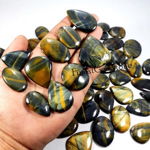 Blauwe tijgeroog edelsteen. Leuk! Blauwe tijgeroog cabochon. Natuurlijk blauw tijgeroog groothandel lot 2500 cts 50 stuks mix vorm tijgeroog voor sieraden