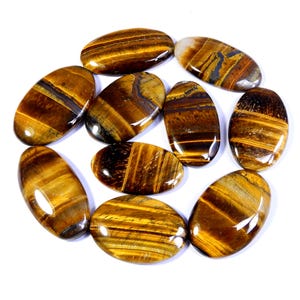 Tijgeroog edelsteen. Geel flitsend tijgeroog. Natuurlijke cabochon met tijgeroog. Ovale tijgeroog groothandel veel voor sieraden. (10 stuks) 352 cts KB-10754