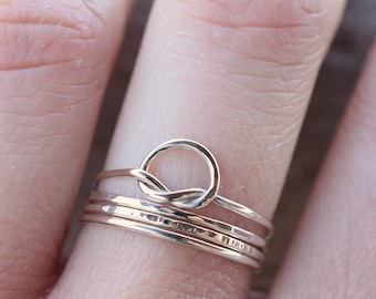 set of 4 sterling silver rings, stackable skinny silver rings with a knot ring