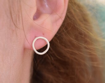 Tiny organic sterling silver circle stud earrings