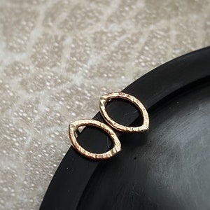 Tiny solid gold hammered leaf earrings, small 9ct yellow gold nature oval bark textured studs, Simple geometric gold earrings