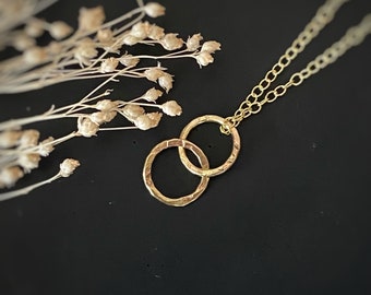 Solid gold interlocking circle pendant, a handmade hammered textured 9ct solid gold hoop, round modern gold chain necklace