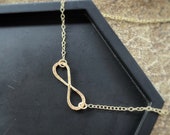 Solid gold interlocking forever infinity necklace, a handmade hammered textured 9ct solid gold symbol, round modern gold chain necklace