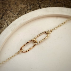 Solid gold interlocking oval circle necklace, a handmade hammered textured 9ct solid gold hoop, round modern gold paper clip chain necklace