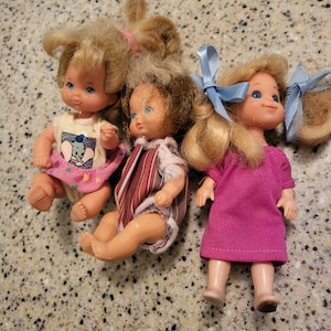 Mattel 1976 (2) small dolls and 1977 sunshine family sister doll