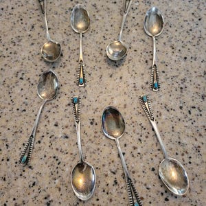 Ike Wilson Navajo genuine sterling silver and turquoise antique eight piece spoon set
