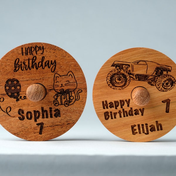 Personalized kids birthday gift. Spinning tops engraved with: Football, Soccer, Basketball, Baseball, Monster trucks, or other cute themes