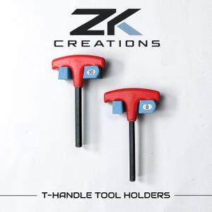 May include: Two T-handle tool holders with red handles and blue mounting brackets, labeled with the numbers 10 and 8. The text ZK CREATIONS appears at the top, and T-HANDLE TOOL HOLDERS is printed at the bottom of the display.